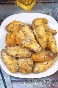 Mouthwatering garlic parm wings air fryer recipe - crispy, juicy, and packed with amazing flavor!