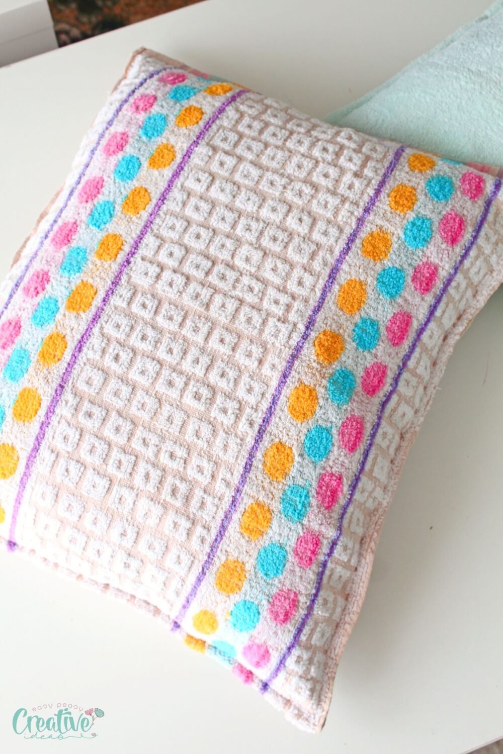 A cozy cat bed made from a towel. Sew one in 10 min - easy steps for a custom spot that matches your home décor!