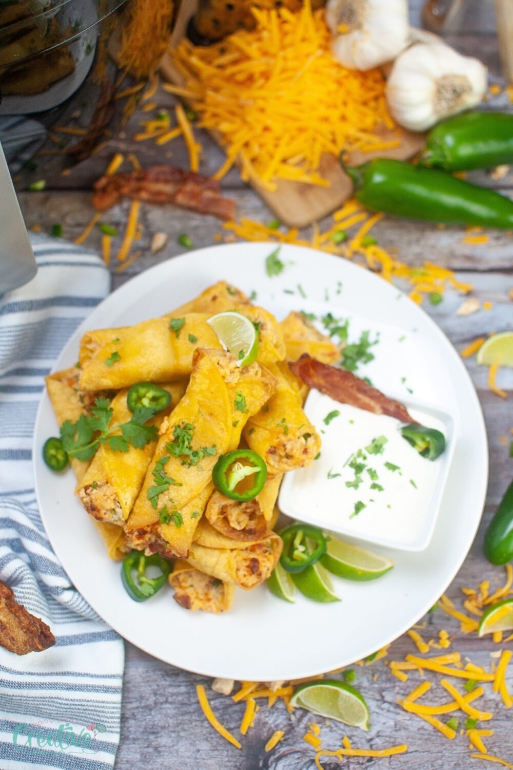 Spicy taquitos: hot, creamy, and satisfying. Perfect blend of flavors for a unique and flavorful snack. Great for any occasion!