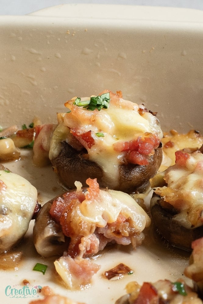 Mouthwatering bacon and cheese stuffed mushrooms - a savory and easy appetizer to delight your guests.