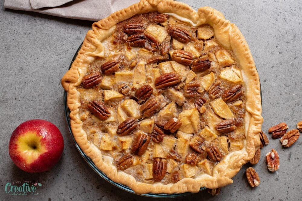 Indulge in Bourbon Apple Pie, a rich, boozy twist on the classic apple pecan pie, perfect for gatherings and holiday feasts!