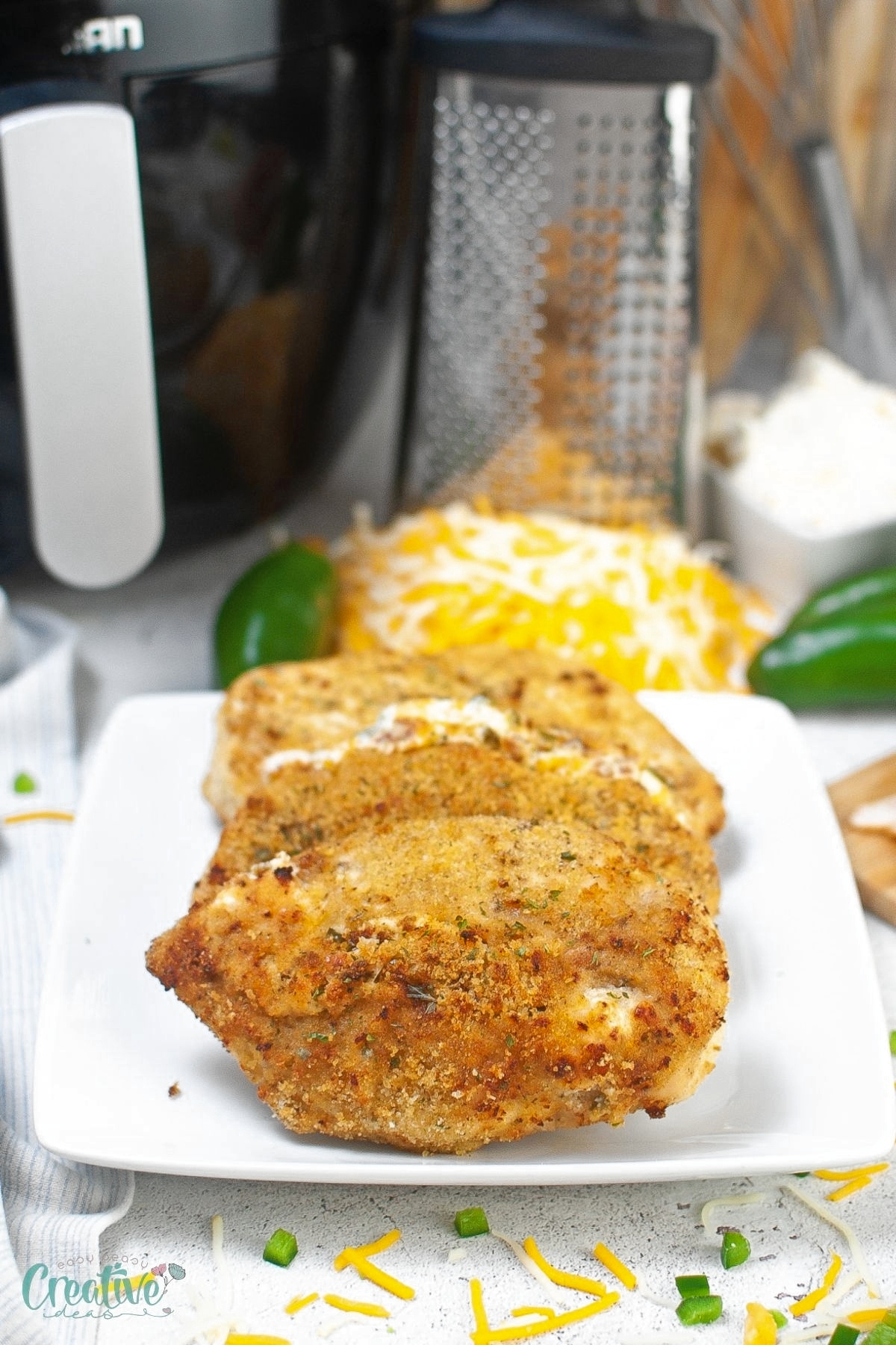 Jalapeno popper stuffed chicken is a delicious and easy-to-make dish that combines the flavors of creamy cheese, spicy jalapenos, and crispy bacon.