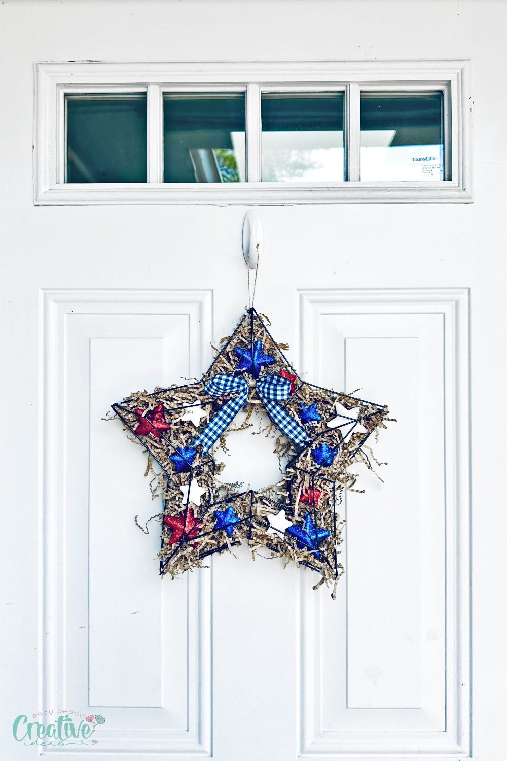 Create a DIY patriotic wreath to showcase your love for the red, white, and blue. Perfect for Independence Day, Memorial Day, or everyday Americana décor!