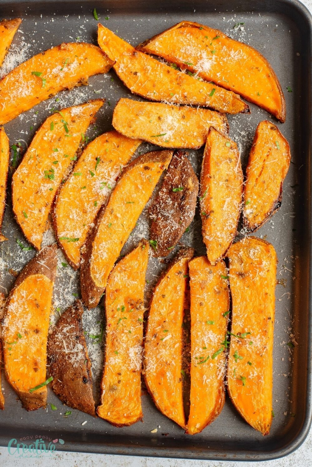 With their caramelized edges and a burst of savory flavors, this Garlic Parmesan Sweet Potato Wedges recipe is bound to become a favorite in your kitchen.