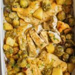 A delicious baking dish featuring chicken and Brussel sprouts in a honey and Dijon mustard sauce..