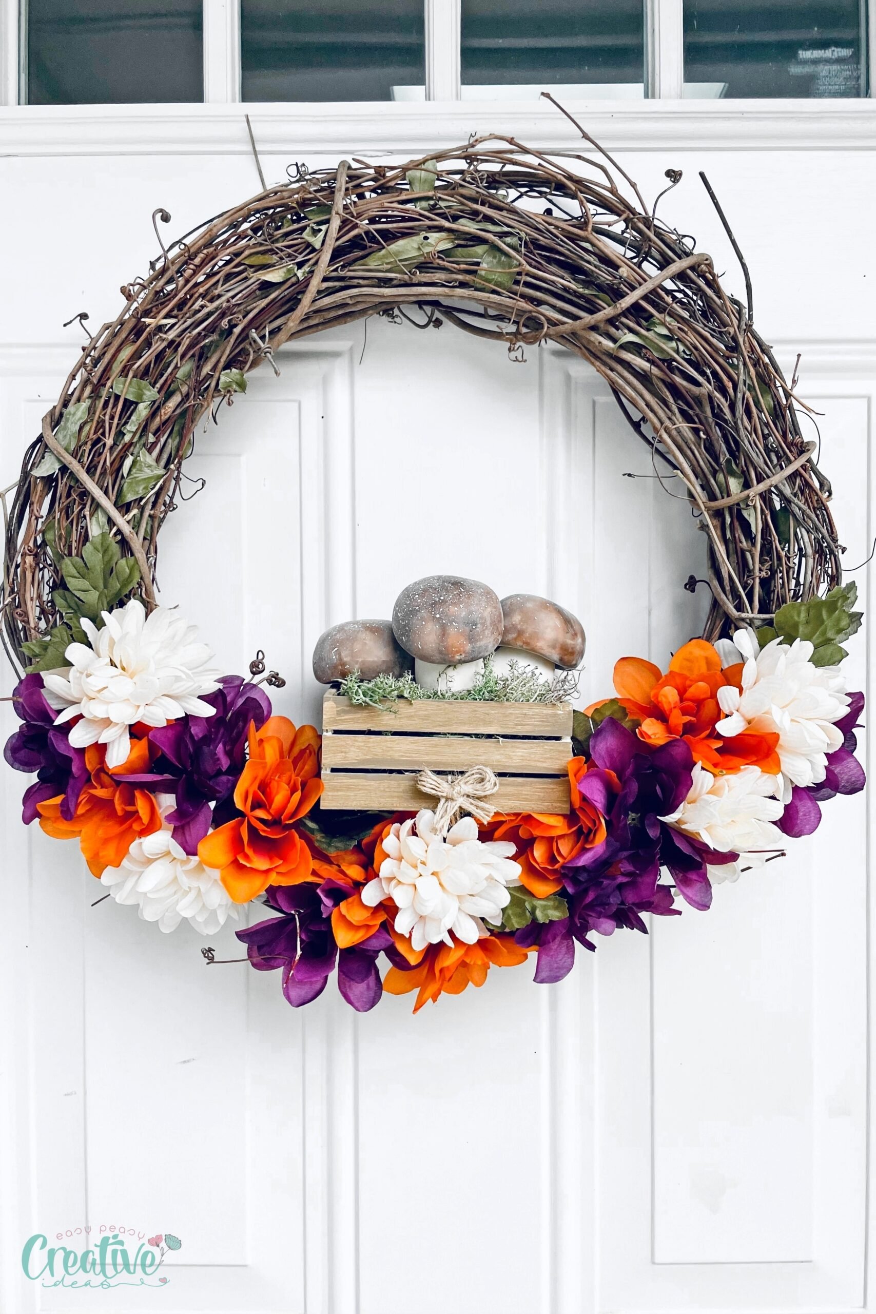 DIY fall wreath with decorative mushrooms