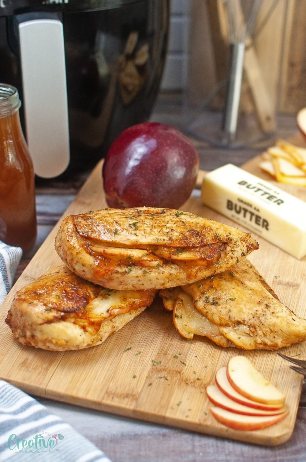 Enjoy a flavorful dish with air fryer apple stuffed chicken breast, featuring juicy chicken breast, apples, Munster cheese, and spices, perfectly cooked in an air fryer.